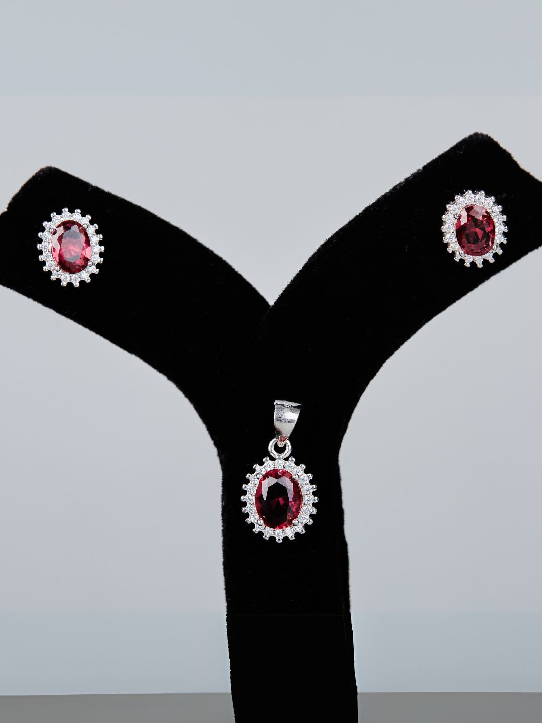 Tansi Jewels Red Ruby Oval Shaped Halo Pendant Set With Earrings